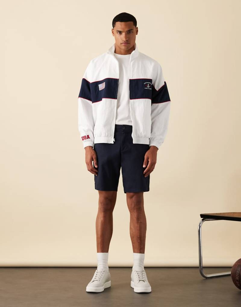 ASOS DESIGN - Slim-Fit-Chino-Shorts in Marineblau in normaler Länge von ASOS DESIGN