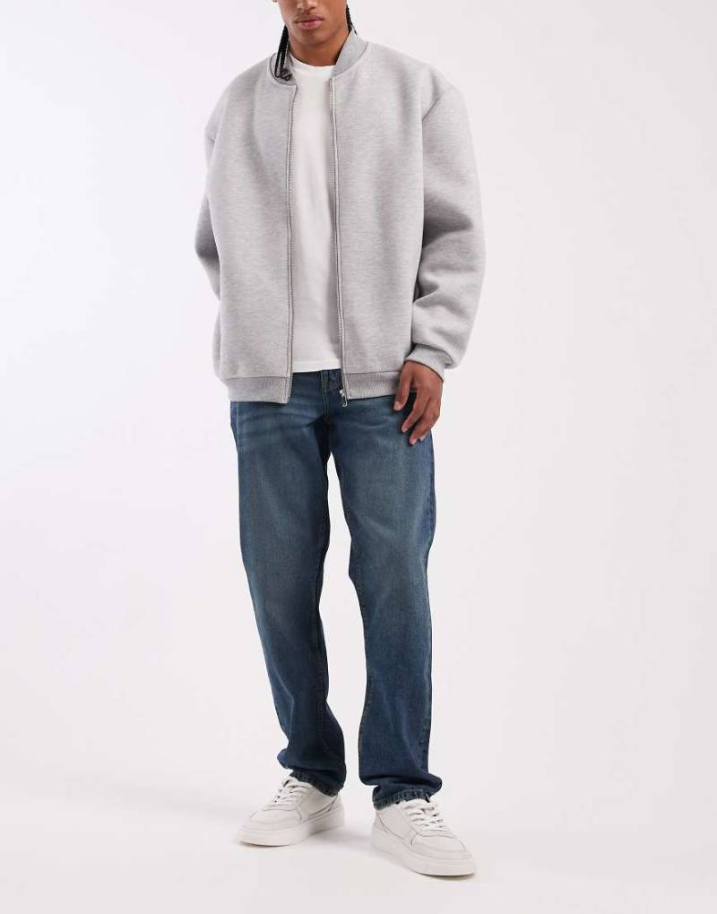 ASOS DESIGN - Slim Fit Jeans in verwaschenem Dunkelblau mit Farbstich von ASOS DESIGN