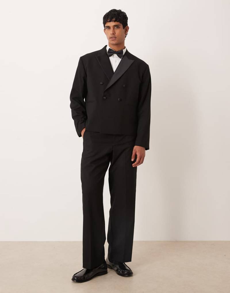 ASOS DESIGN - Smoking-Hose in Schwarz mit weitem Bein ASOS DESIGN - Smoking-Hose in Schwarz mit weitem Bein von ASOS DESIGN