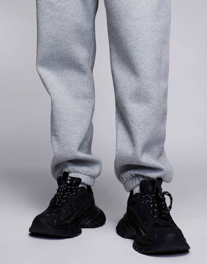 ASOS DESIGN - Sneaker in Schwarz und Weiß mit dicker Sohle von ASOS DESIGN