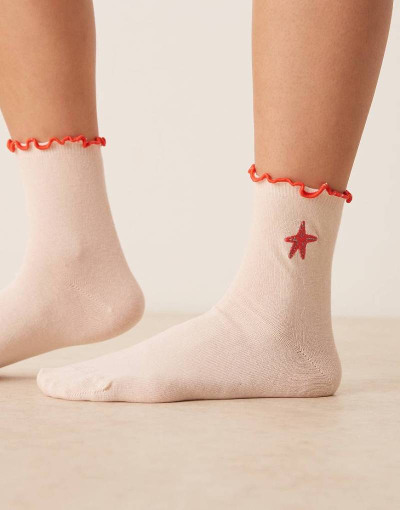 ASOS DESIGN - Socken mit aufgesticktem Seestern in Rosa von ASOS DESIGN
