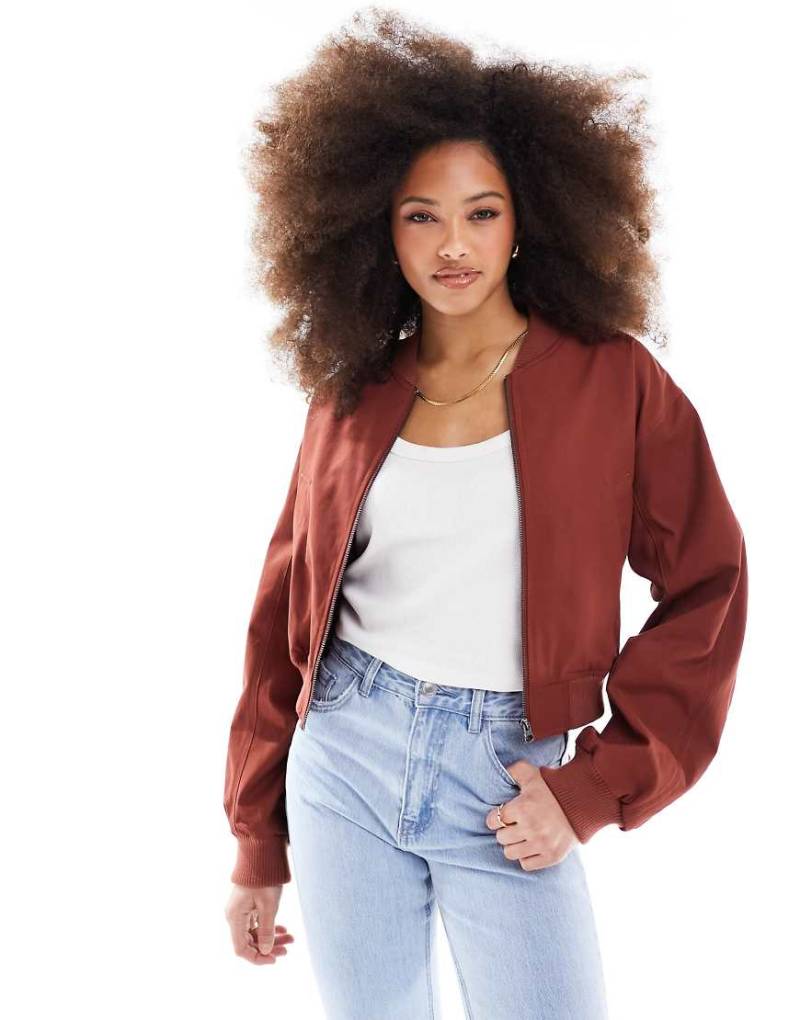 ASOS DESIGN - Sommer-Bomberjacke in Terrakotta aus gewaschener Baumwolle-Orange von ASOS DESIGN