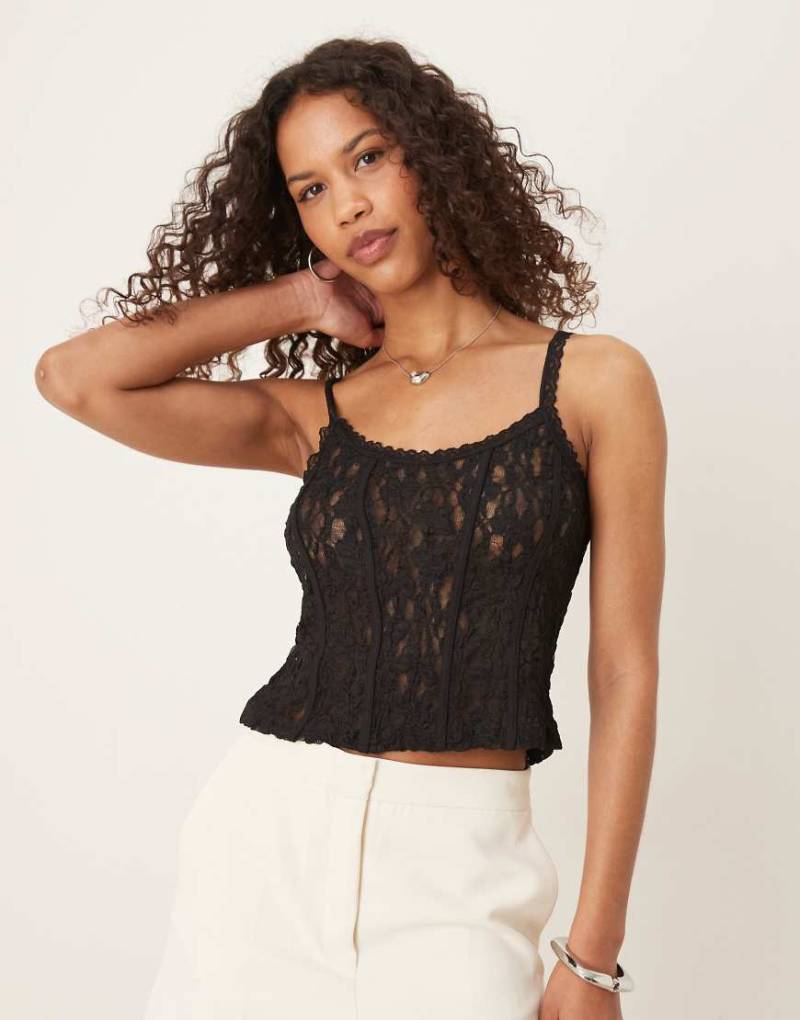 ASOS DESIGN - Camisole aus transparenter Spitze in Schwarz mit Zierborte ASOS DESIGN - Camisole aus transparenter Spitze in Schwarz mit Zierborte von ASOS DESIGN