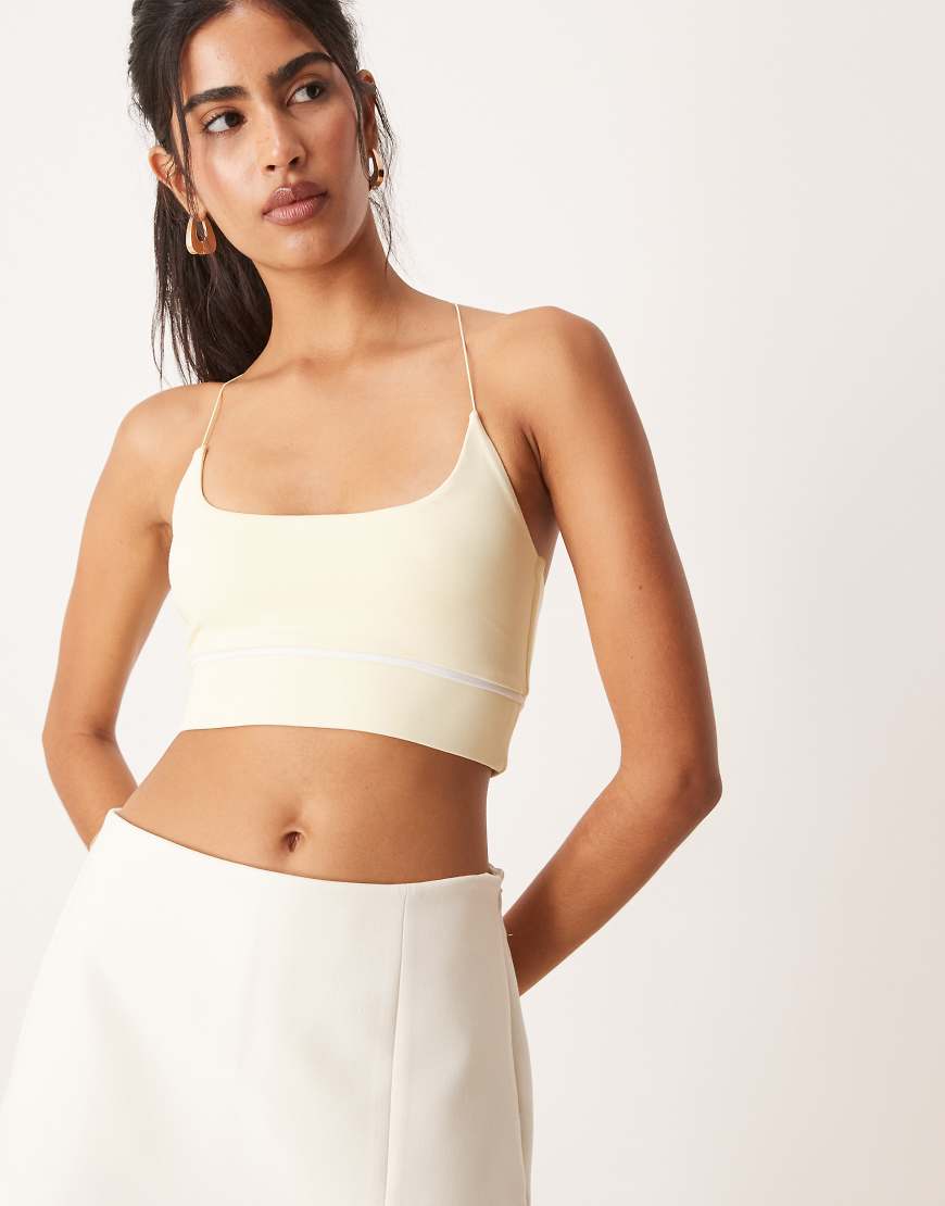 ASOS DESIGN - Sportives Träger-Bustier in Zitronengelb mit elastischem Detail und tiefem Ausschnitt von ASOS DESIGN
