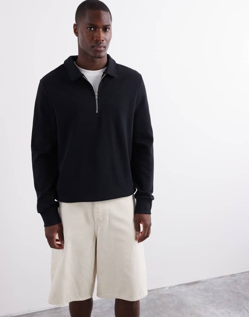 ASOS DESIGN - Sweatshirt in Schwarz mit kurzem Reißverschluss und Kragen von ASOS DESIGN
