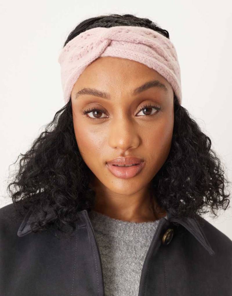 ASOS DESIGN - Stirnband aus Pointelle-Strick in Rosa mit gedrehtem Detail von ASOS DESIGN