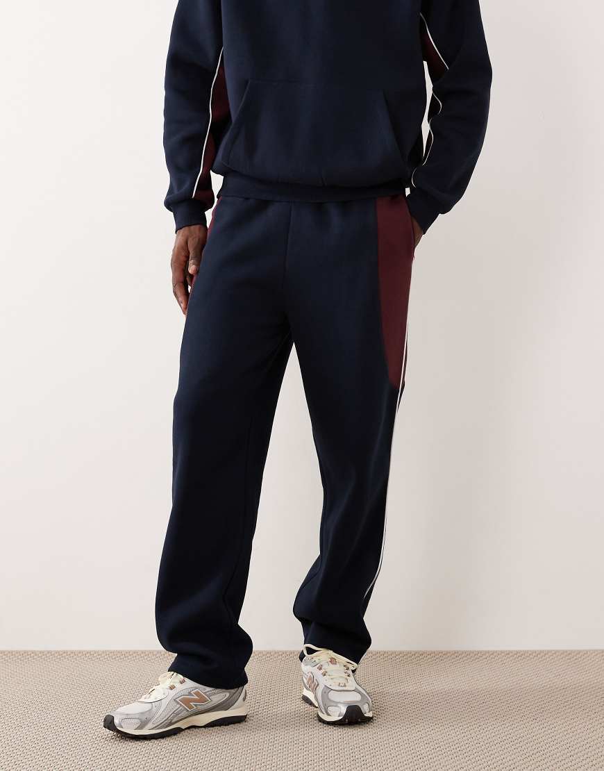 ASOS DESIGN - Straight Jogginghose in Marineblau mit abgenähten Stoffbahnen von ASOS DESIGN