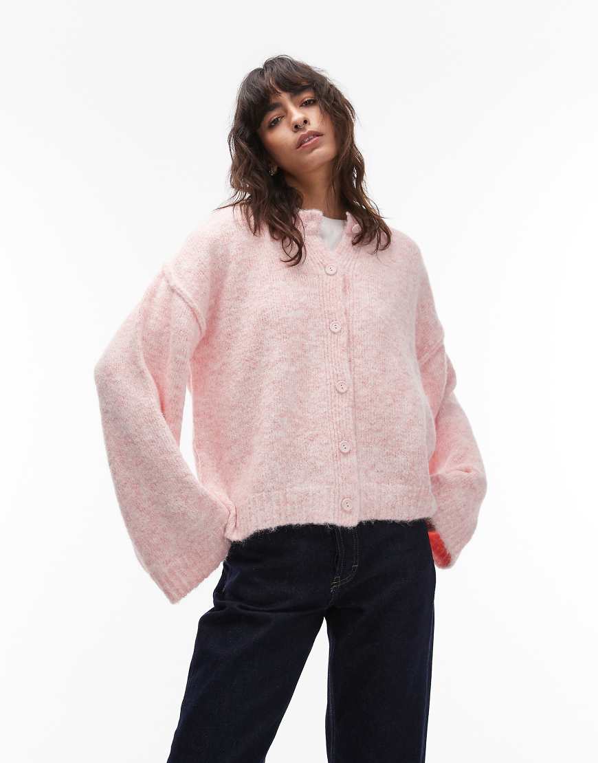 ASOS DESIGN - Strickjacke aus Wolle in Rosa mit sichtbaren Nähten von ASOS DESIGN