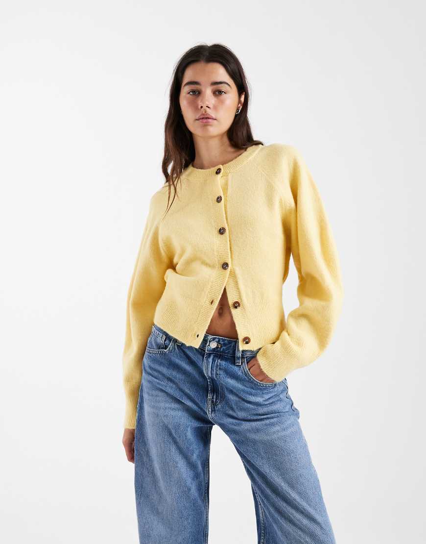 ASOS DESIGN - Strickjacke in Buttermilch mit Raglan-Ärmeln und Rundhalsausschnitt-Gelb von ASOS DESIGN