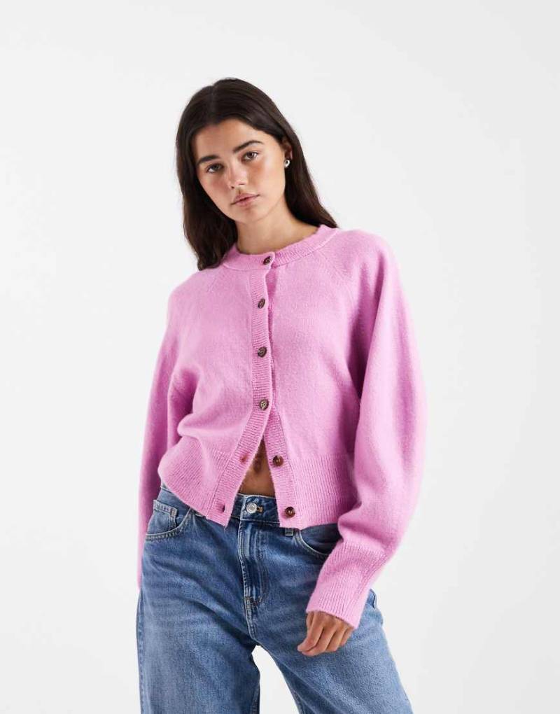 ASOS DESIGN - Strickjacke in Rosa mit Raglan-Ärmeln und Rundhalsausschnitt von ASOS DESIGN
