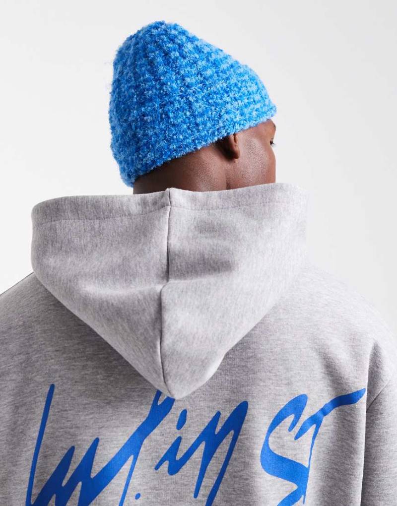 ASOS DESIGN - Strickmütze aus Bouclé in Blau von ASOS DESIGN