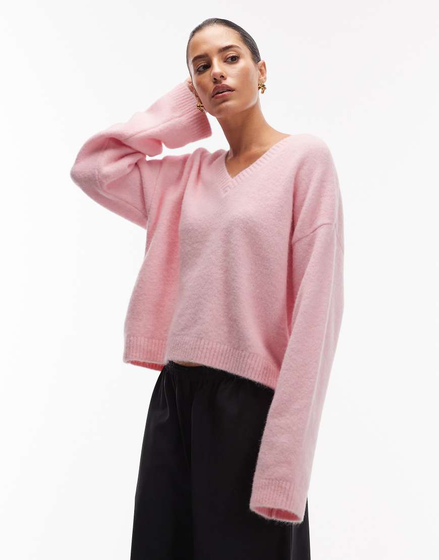 ASOS DESIGN - Strickpullover in Rosa mit weiten Ärmeln und Wollanteil von ASOS DESIGN