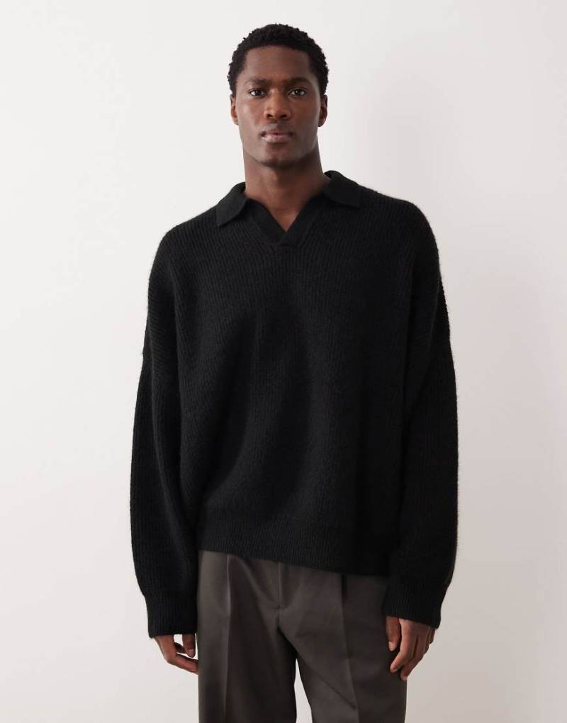 ASOS DESIGN - Strickpullover in Schwarz mit Patentmuster, extremer, kastiger Oversize-Passform und eingekerbtem Ausschnitt von ASOS DESIGN
