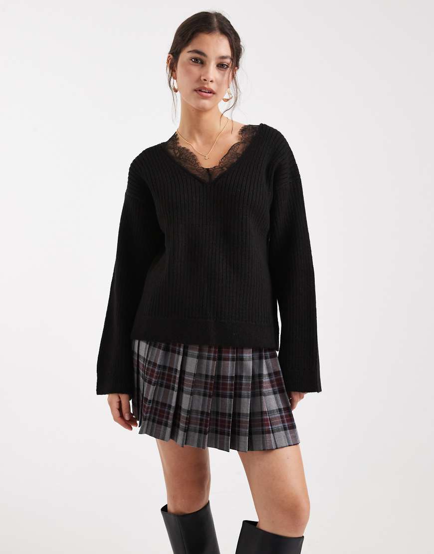 ASOS DESIGN - Strickpullover in Schwarz mit tiefem V-Ausschnitt und Spitzenbesatz von ASOS DESIGN