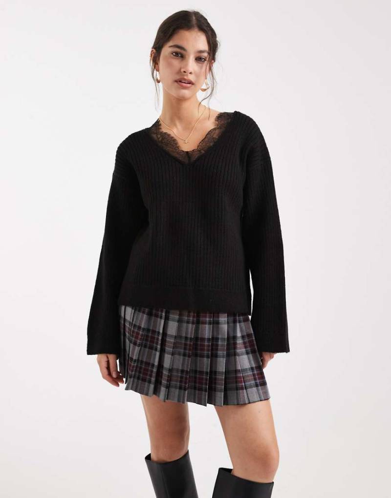 ASOS DESIGN - Strickpullover in Schwarz mit tiefem V-Ausschnitt und Spitzenbesatz von ASOS DESIGN