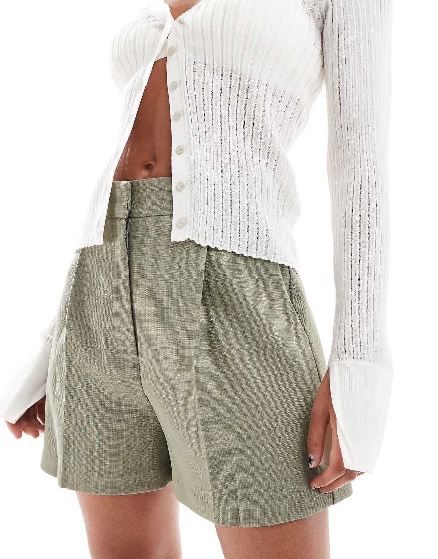 ASOS DESIGN - Strukturierte, elegante Shorts in Khaki in A-Linie-Grün ASOS DESIGN - Strukturierte, elegante Shorts in Khaki in A-Linie-Grün von ASOS DESIGN
