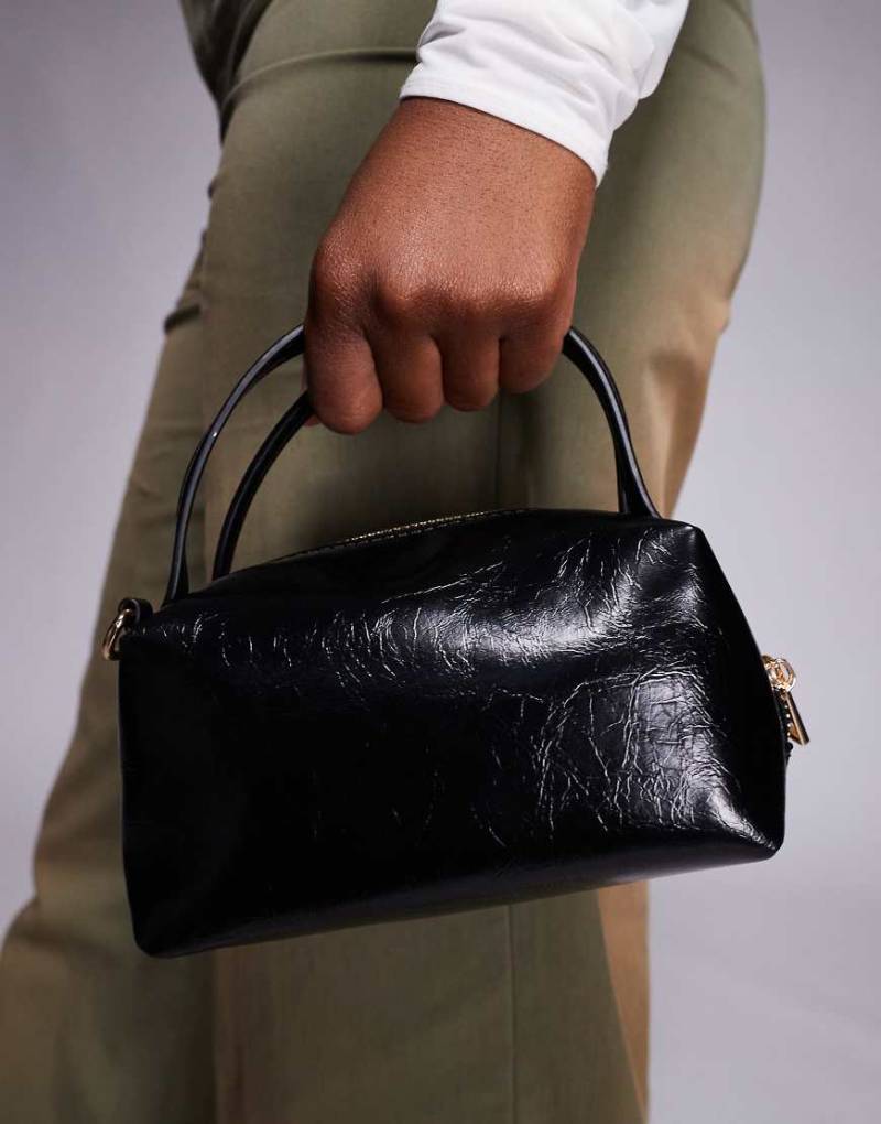 ASOS DESIGN - Strukturierte, kleine Clutch-Handtasche in Schwarz mit Umhängeriemen von ASOS DESIGN