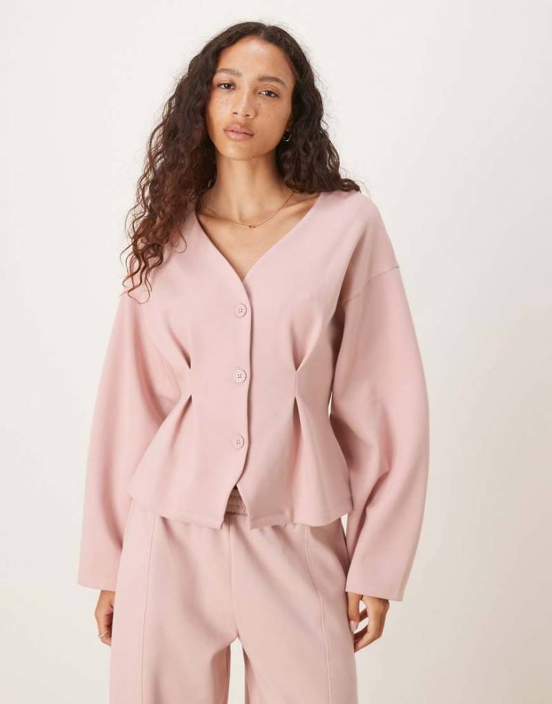ASOS DESIGN - Strukturierte Strickjacke aus Interlock-Stoff in Rosa von ASOS DESIGN