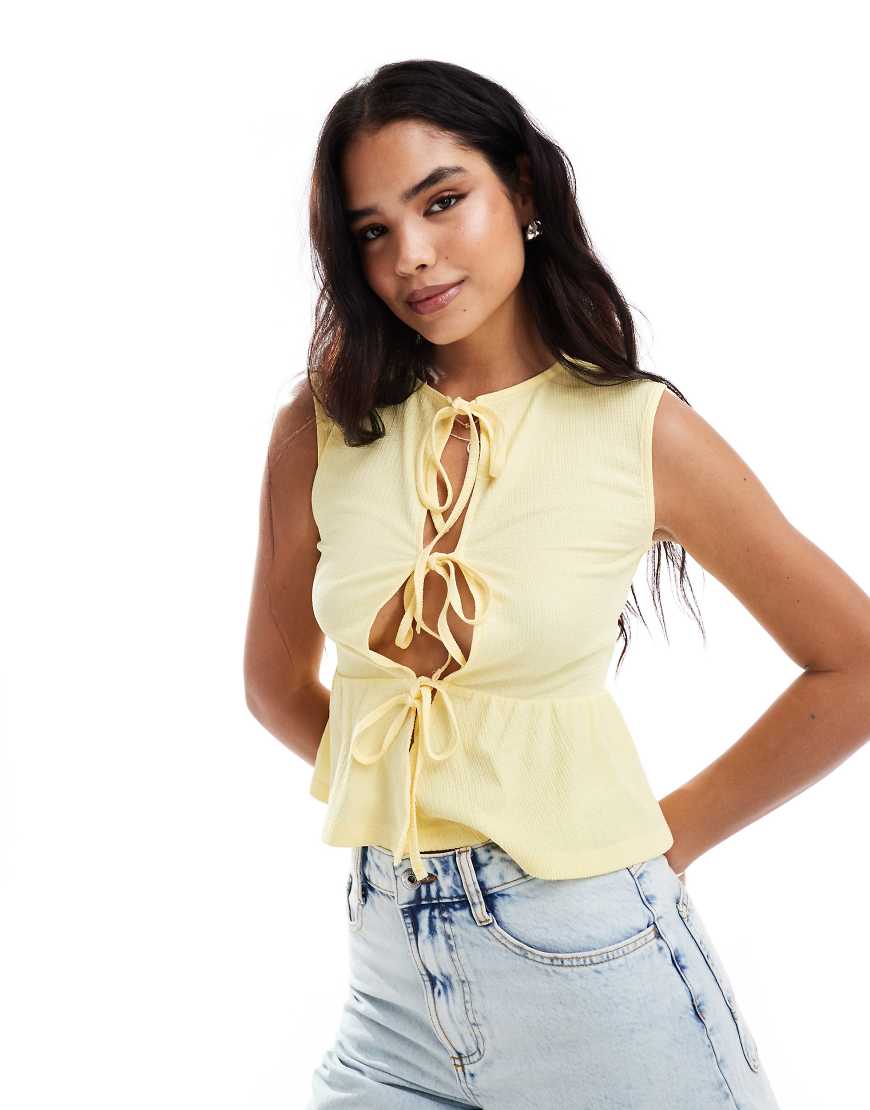 ASOS DESIGN - Strukturierte Weste mit geschnürter Vorderseite in Zitronengelb von ASOS DESIGN