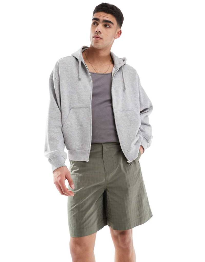 ASOS DESIGN - Strukturierte, lange Shorts in Grün mit Workwear-Aufnäher-Braun ASOS DESIGN - Strukturierte, lange Shorts in Grün mit Workwear-Aufnäher-Braun von ASOS DESIGN