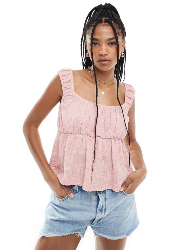 ASOS DESIGN - Strukturiertes Babydoll-Top in Rosa von ASOS DESIGN