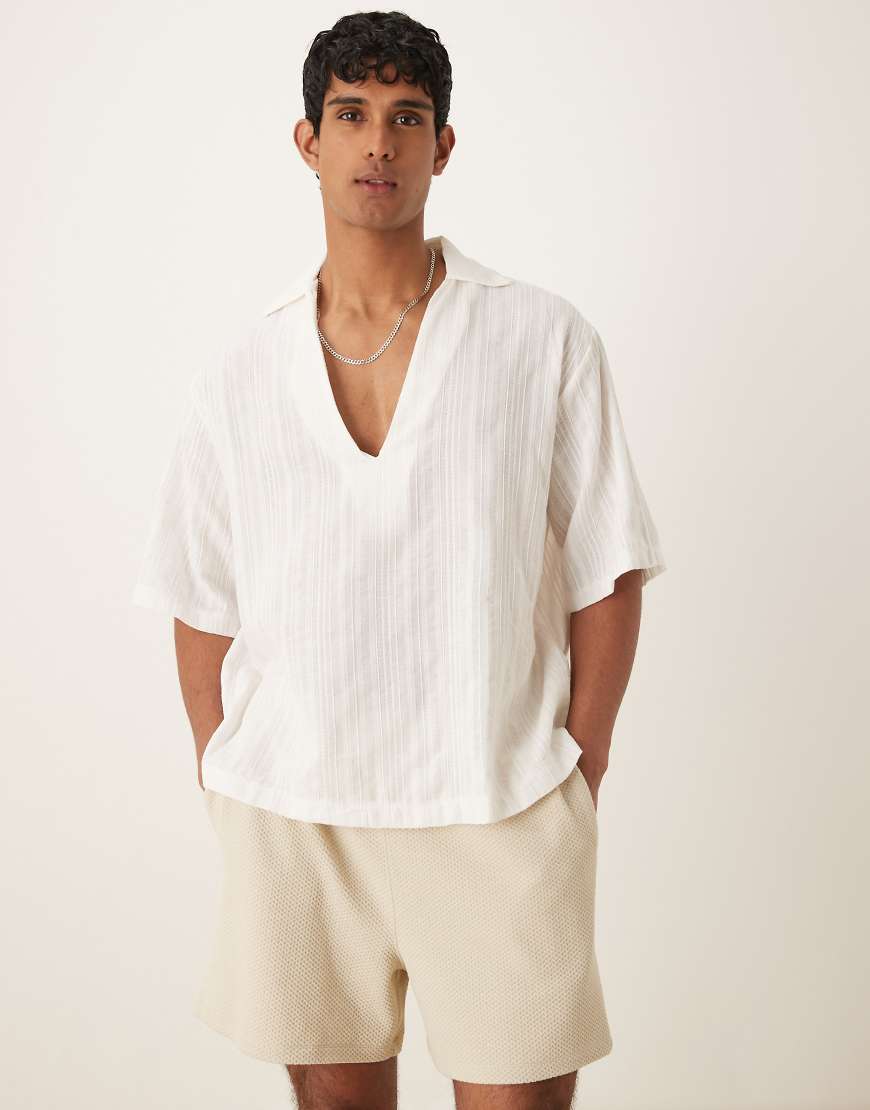 ASOS DESIGN - Strukturiertes Oversize-Schlupfhemd in hellem Weiß-Rosa von ASOS DESIGN