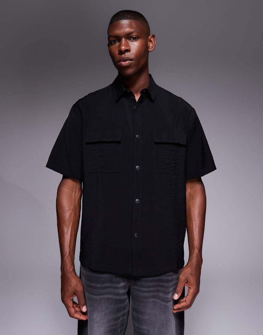 ASOS DESIGN - Strukturiertes Relaxed-Fit-T-Shirt in Schwarz von ASOS DESIGN