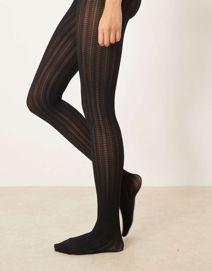 ASOS DESIGN - Strumpfhose in Schwarz mit Herz-, Punkte- und Streifenmuster ASOS DESIGN - Strumpfhose in Schwarz mit Herz-, Punkte- und Streifenmuster von ASOS DESIGN