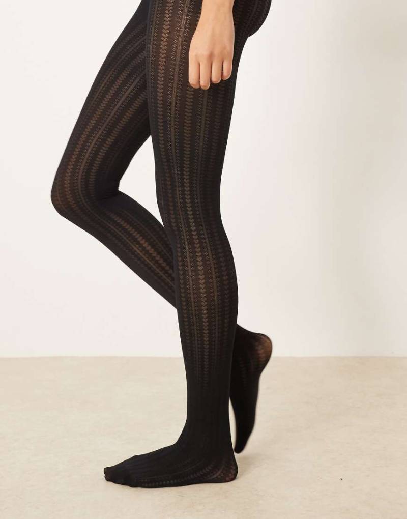 ASOS DESIGN - Strumpfhose in Schwarz mit Herz-, Punkte- und Streifenmuster ASOS DESIGN - Strumpfhose in Schwarz mit Herz-, Punkte- und Streifenmuster von ASOS DESIGN