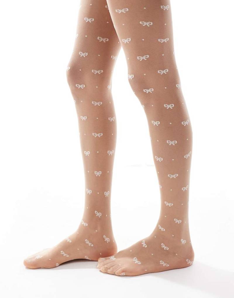 ASOS DESIGN - Strumpfhose in Weiß mit Pünktchen und Schleifen von ASOS DESIGN