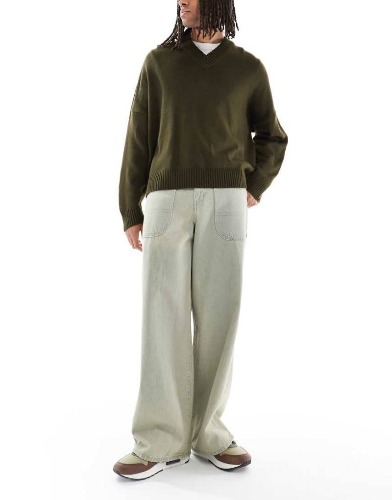 ASOS DESIGN - Super-Baggy Jeans in hellblauer Waschung mit verstellbarer Lasche hinten von ASOS DESIGN