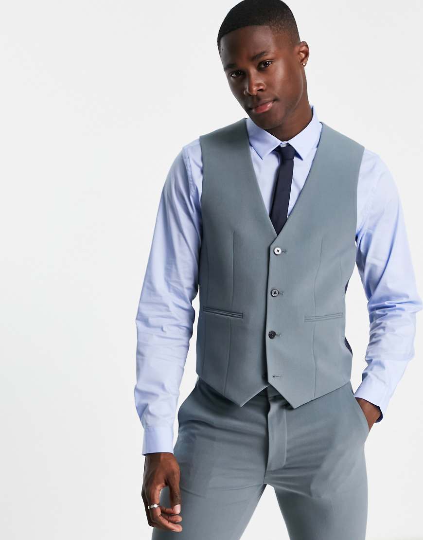 ASOS DESIGN - Superenge Anzugweste in gedämpftem Blau ASOS DESIGN - Superenge Anzugweste in gedämpftem Blau von ASOS DESIGN