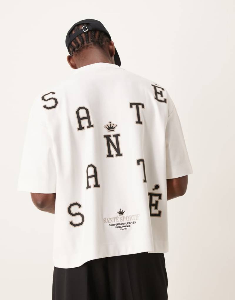 ASOS DESIGN - Superschweres, kastiges Oversize-T-Shirt in Premiumweiß mit Text-Print am Rücken von ASOS DESIGN