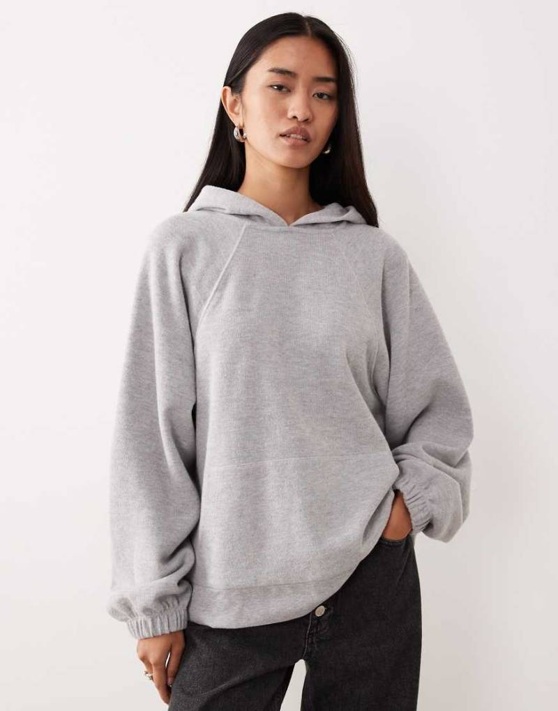 ASOS DESIGN - Superweicher Oversize-Kapuzenpullover in meliertem Grau mit Raglanärmeln von ASOS DESIGN