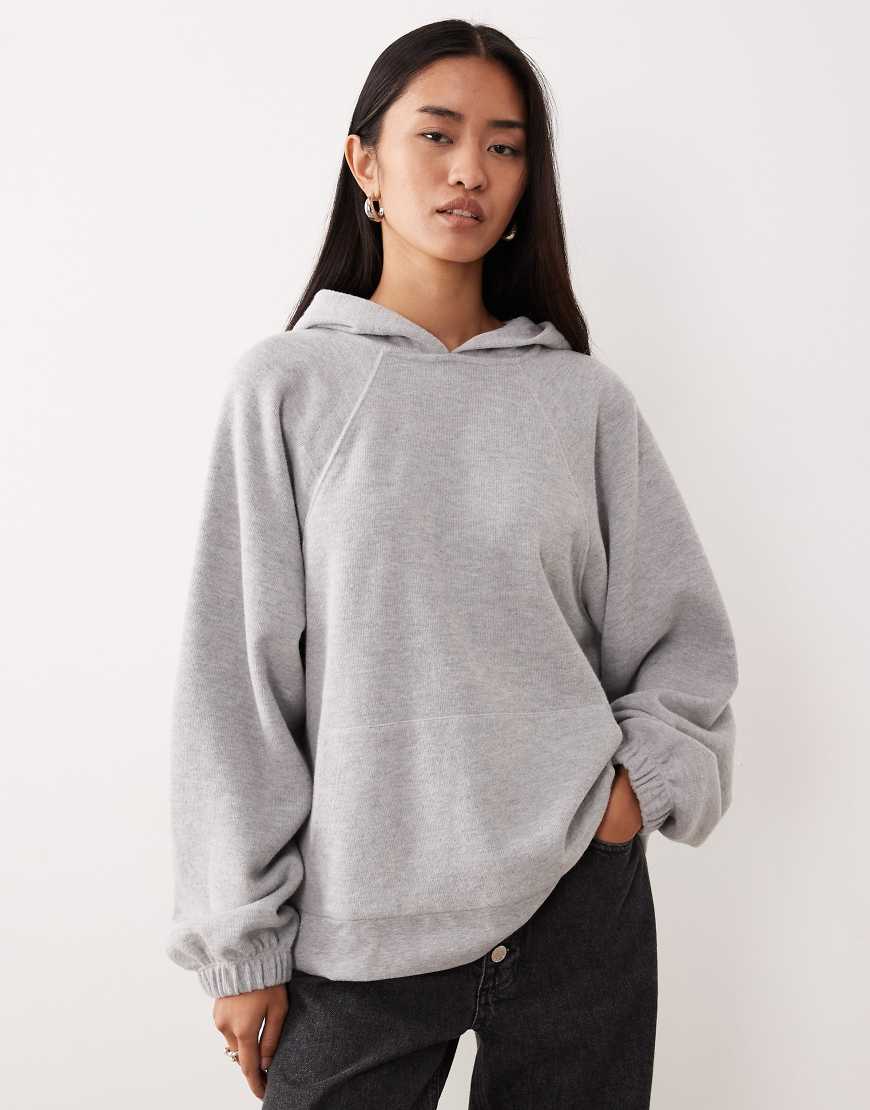ASOS DESIGN - Superweicher Oversize-Kapuzenpullover in meliertem Grau mit Raglanärmeln von ASOS DESIGN