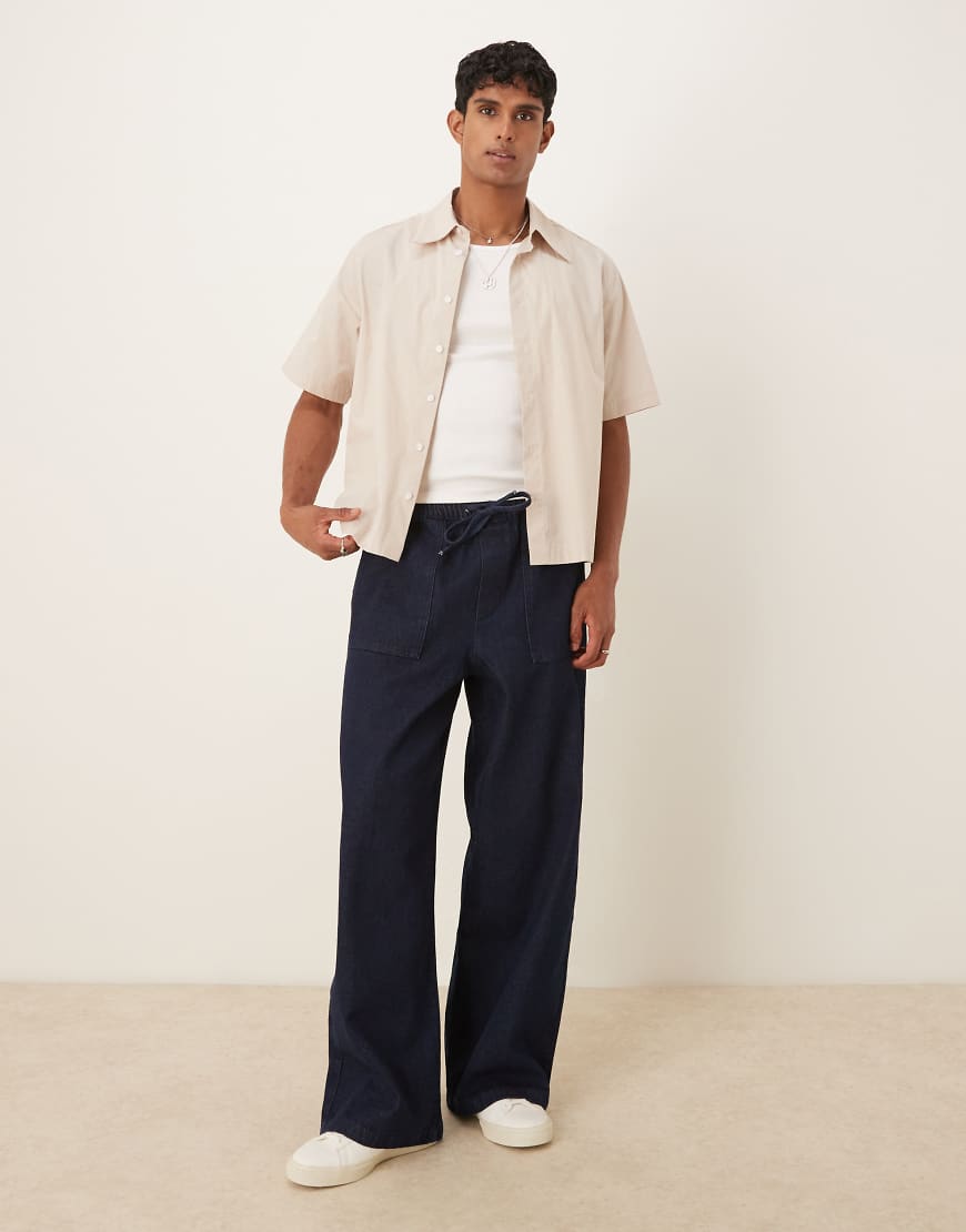 ASOS DESIGN - Superweite, leichte Jeans in Raw-Waschung-Blau von ASOS DESIGN