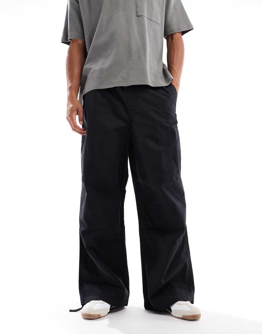 ASOS DESIGN - Baggy-Fit-Cargohose aus Ripstop in Schwarz mit Oversize-Passform von ASOS DESIGN