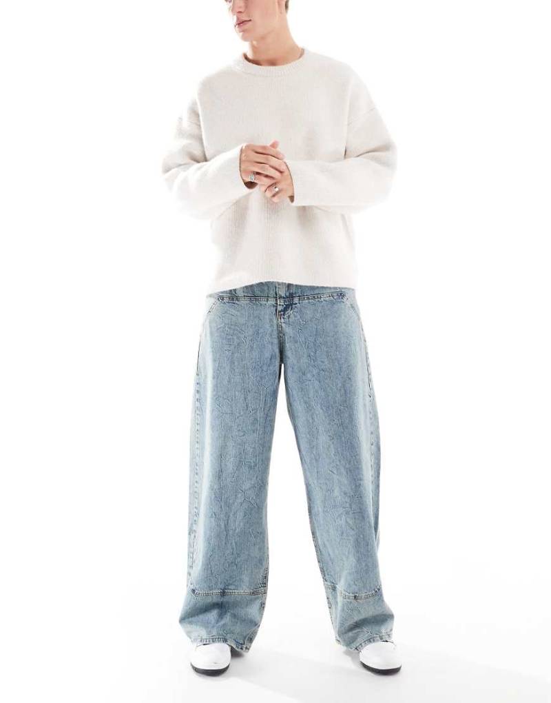 ASOS DESIGN - Superweite Carpenter-Jeans in mittelblauer Waschung von ASOS DESIGN