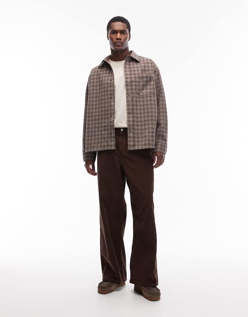 ASOS DESIGN - Loose-Fit-Cordhose in Braun-Brown von ASOS DESIGN