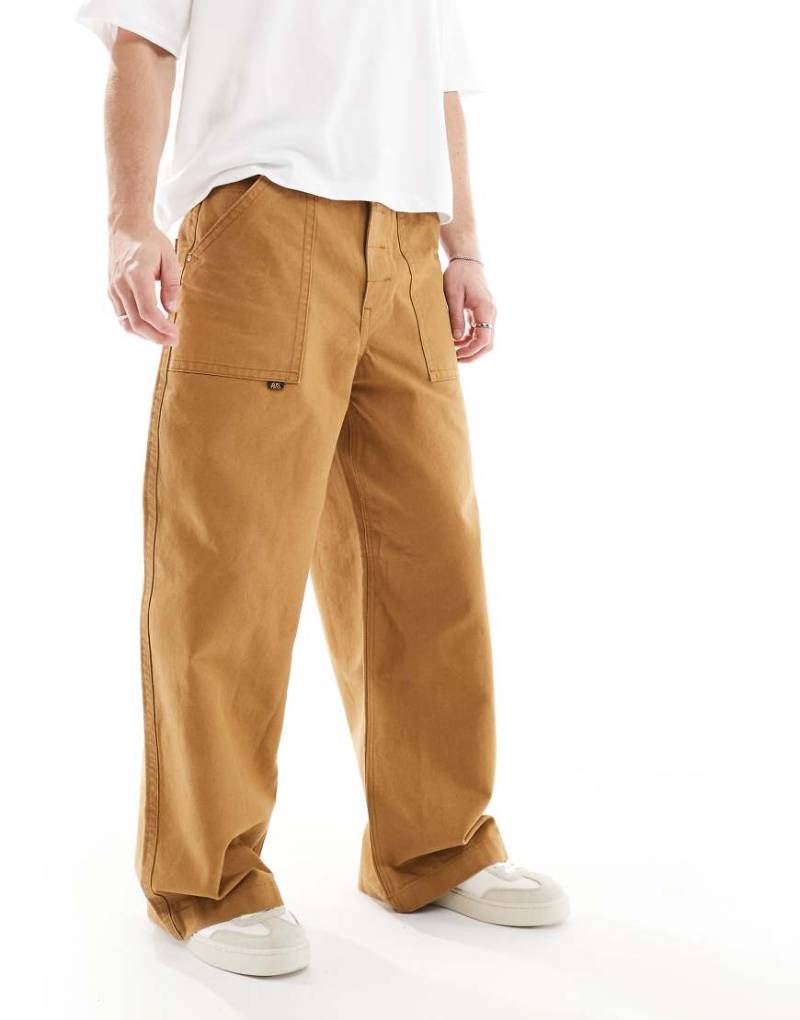 ASOS DESIGN - Superweite Hose in Schwarz mit Gesäßtasche-Braun von ASOS DESIGN