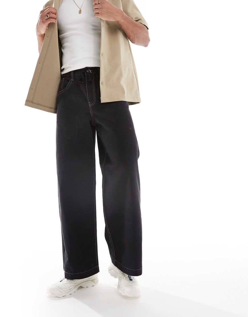 ASOS DESIGN - Superweite Hose in Schwarz mit bestickten Gesäßtaschen von ASOS DESIGN