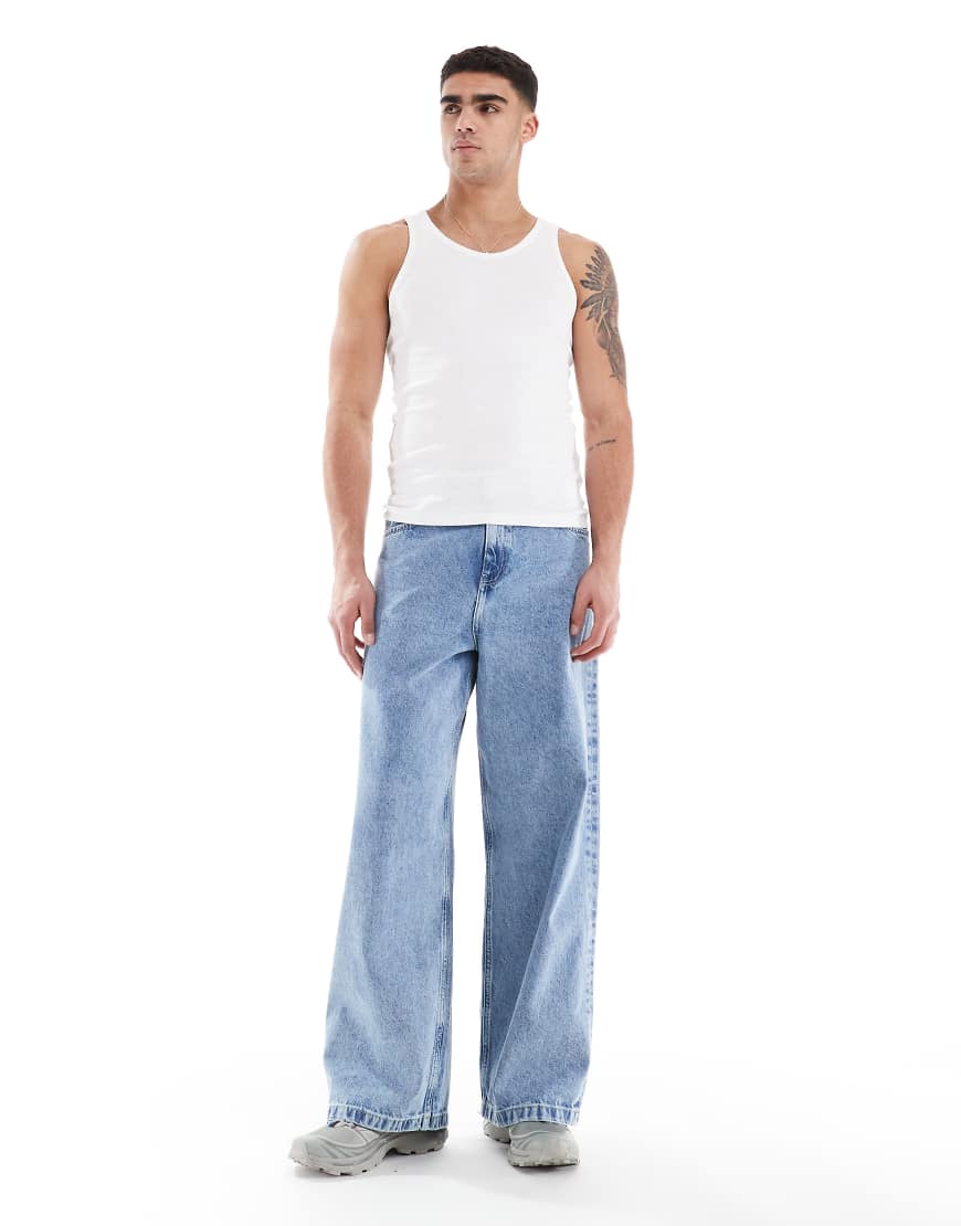 ASOS DESIGN - Superweite Jeans in 90er-Stone-Waschung-Blau von ASOS DESIGN