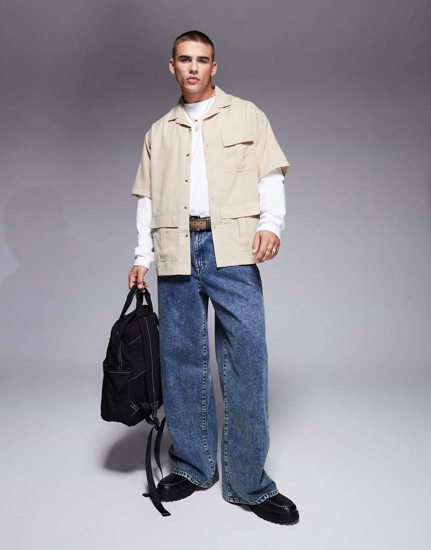ASOS DESIGN - Superweite Jeans in dunkelblauer Waschung ASOS DESIGN - Superweite Jeans in dunkelblauer Waschung von ASOS DESIGN