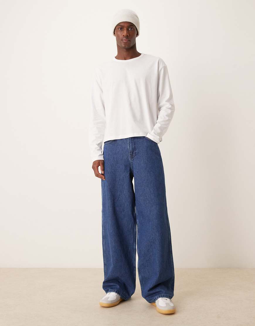 ASOS DESIGN - Superweite Jeans in mittelblauer Waschung mit elastischem Rückenteil ASOS DESIGN - Superweite Jeans in mittelblauer Waschung mit elastischem Rückenteil von ASOS DESIGN