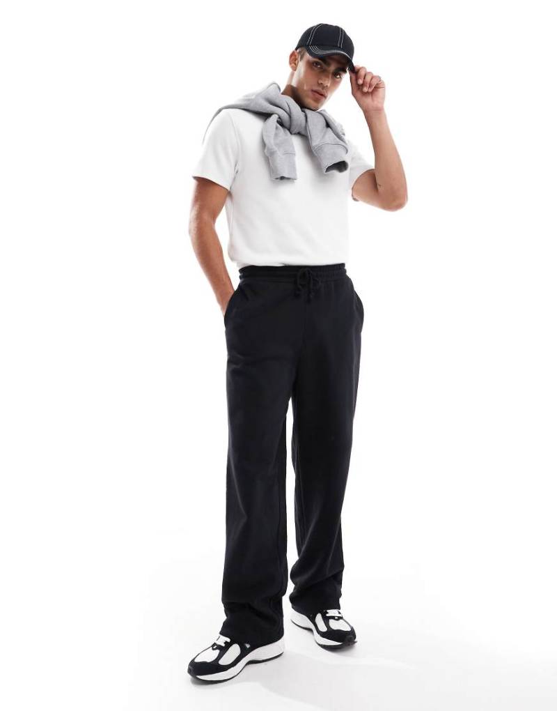ASOS DESIGN - Superweite Jogginghose in Schwarz von ASOS DESIGN