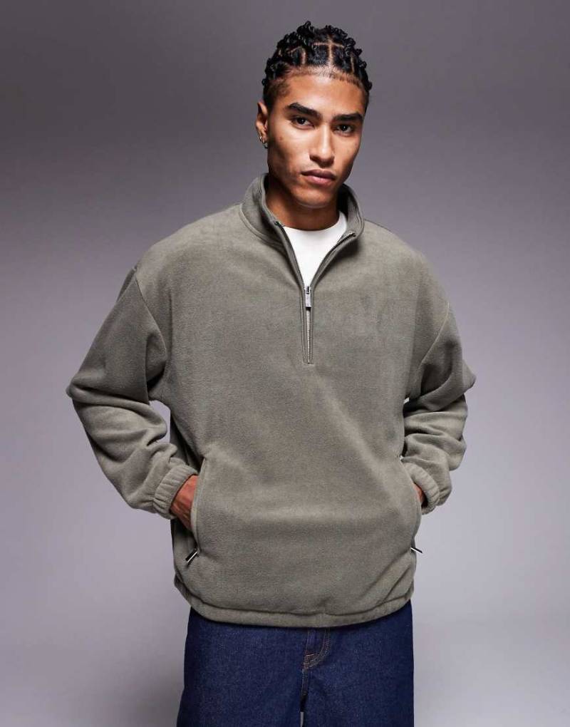 ASOS DESIGN - Sweatshirt aus Fleece in Anthrazit mit extremer Oversize-Passform, Stehkragen und kurzem Reißverschluss-Grau von ASOS DESIGN