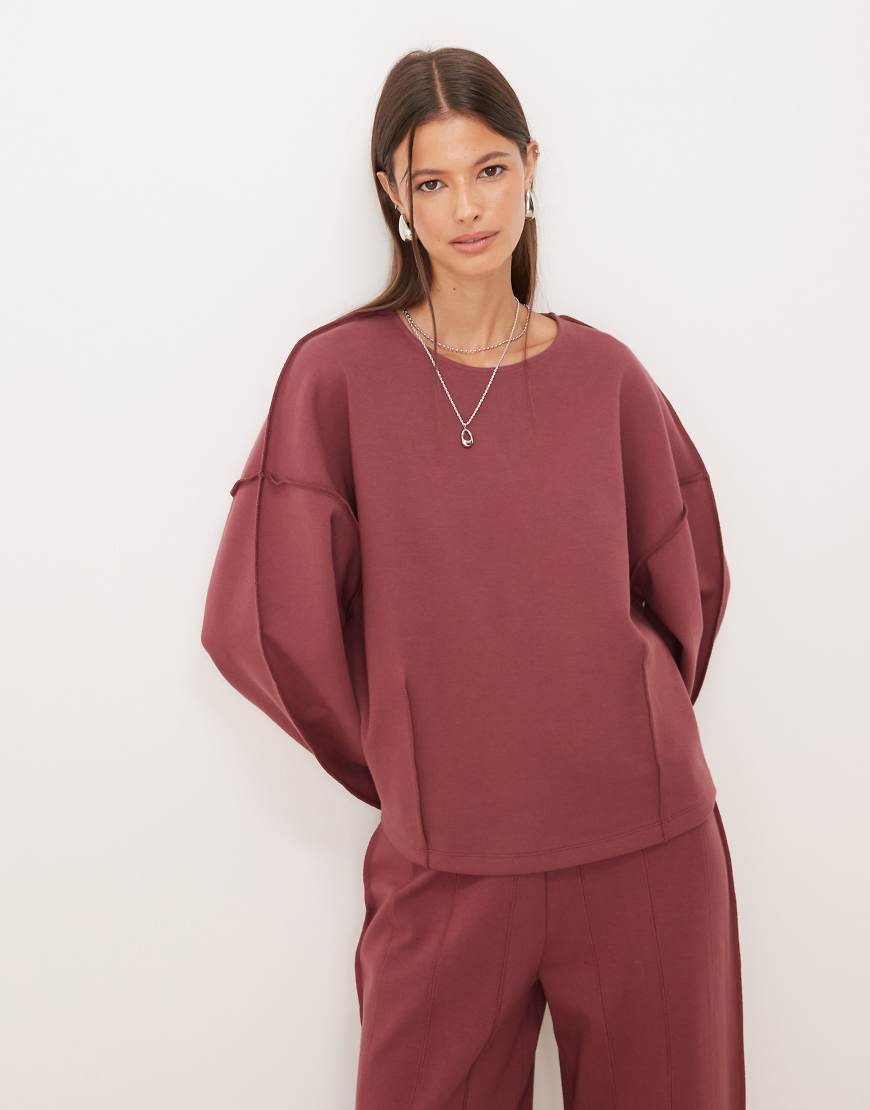 ASOS DESIGN - Sweatshirt aus Interlock in dunklem Rosé mit U-Boot-Ausschnitt und Nahtdetail-Lila ASOS DESIGN - Sweatshirt aus Interlock in dunklem Rosé mit U-Boot-Ausschnitt und Nahtdetail-Lila von ASOS DESIGN