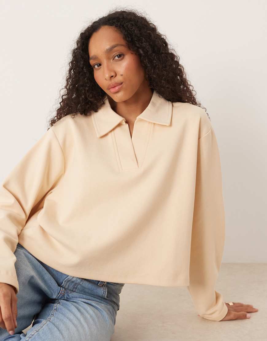 ASOS DESIGN - Sweatshirt im Rugby-Stil aus Interlock-Stoff in Buttermilchgelb-Blau ASOS DESIGN - Sweatshirt im Rugby-Stil aus Interlock-Stoff in Buttermilchgelb-Blau von ASOS DESIGN