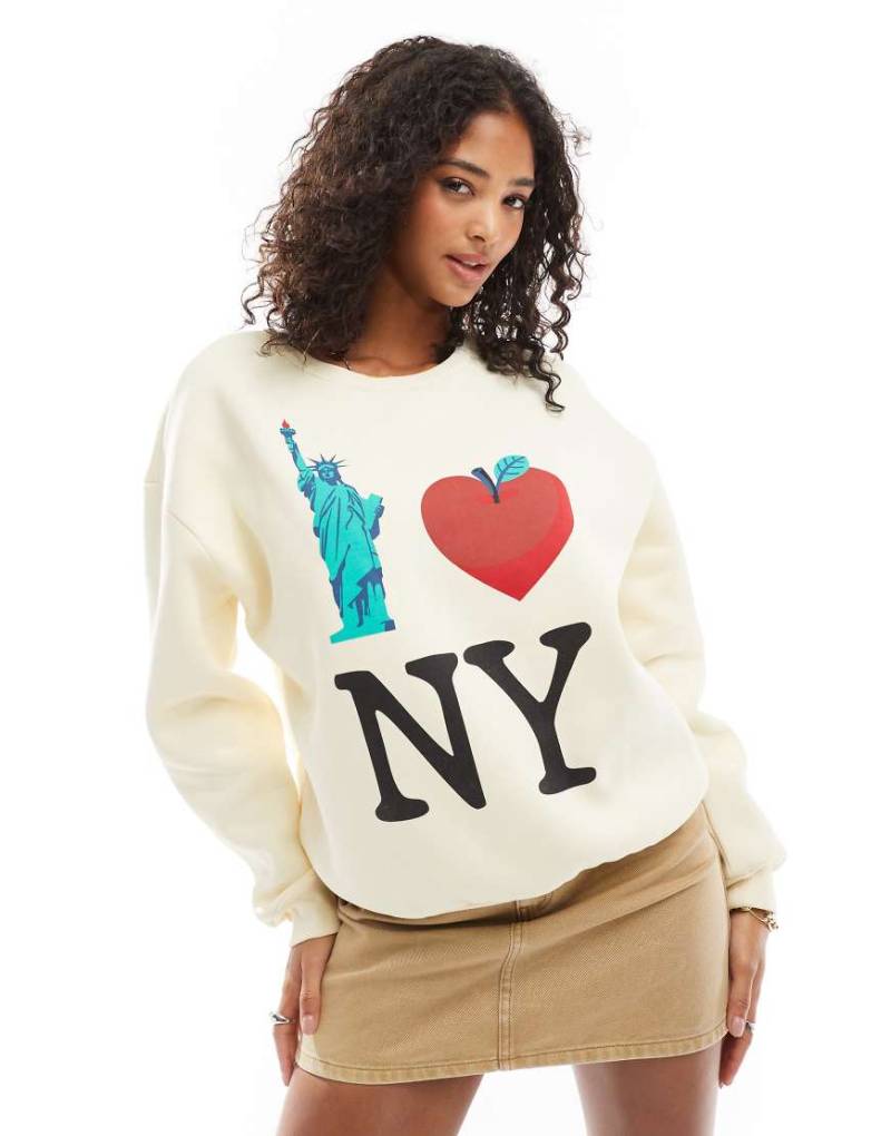 ASOS DESIGN - Sweatshirt in Ecru mit angerauter Rückseite und „New York"-Grafikprint-Weiß von ASOS DESIGN