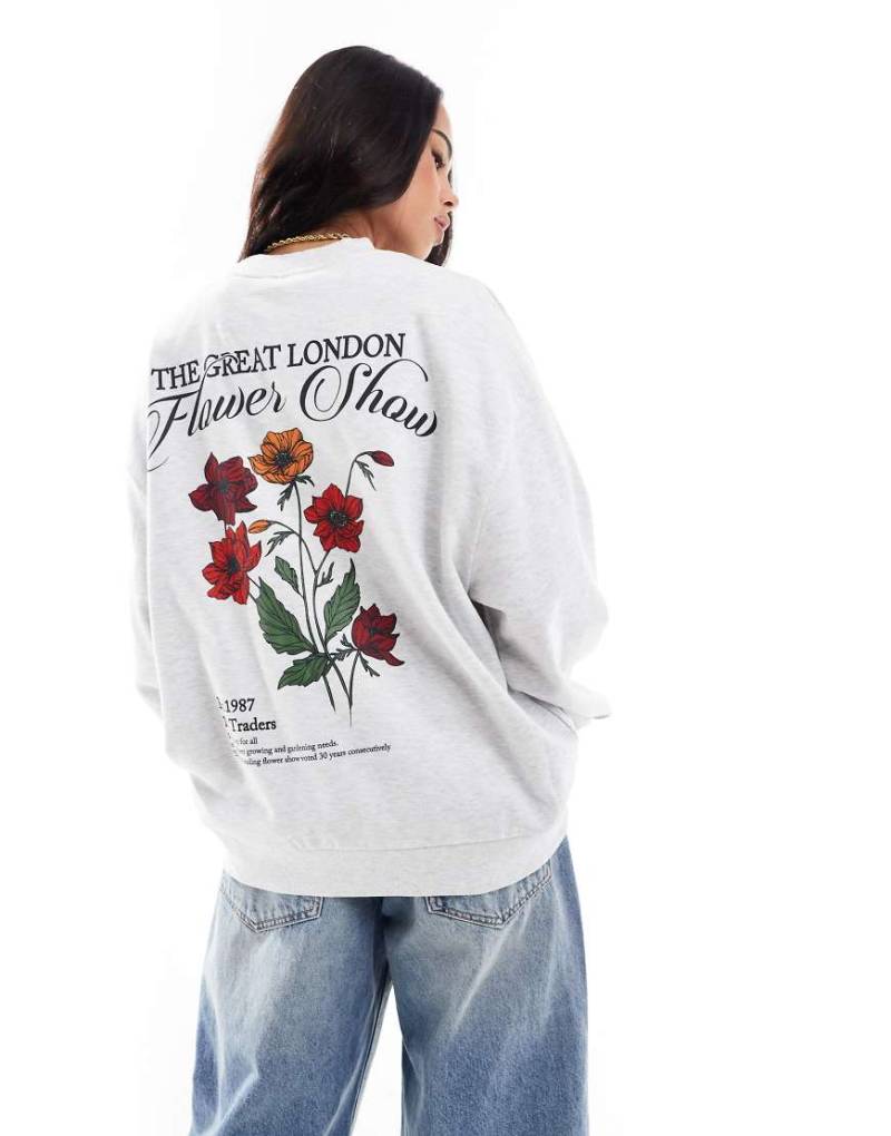 ASOS DESIGN - Sweatshirt in Eisgrau meliert mit „Flower Show"-Grafik von ASOS DESIGN